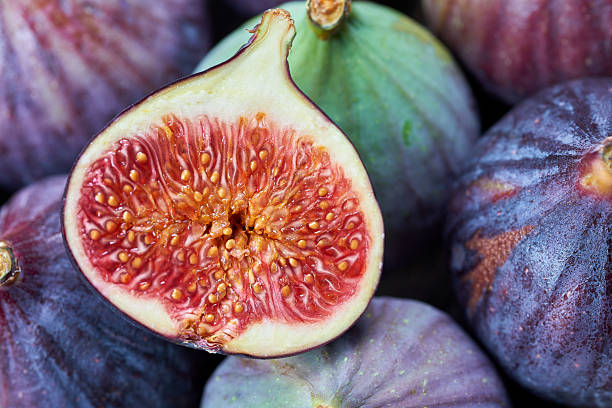 istock Fresh fig fruits on a wooden table 622069360