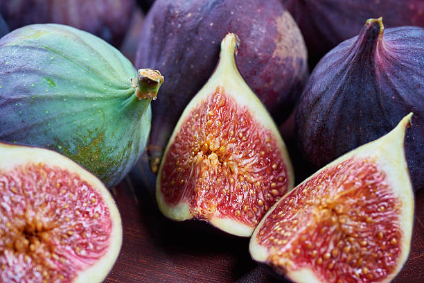 istock Fresh fig fruits on a wooden table 622069962