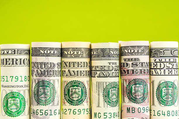 istock rolls of american dollar banknotes in one row 622071010