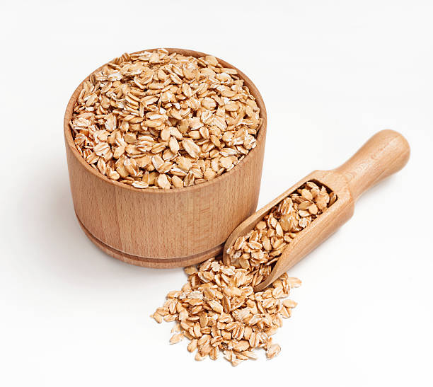 istock Oat flakes premium quality in wooden bowl 622071224