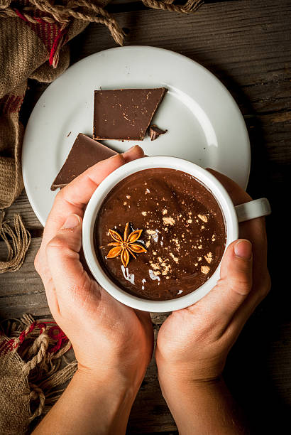 istock Girl drinks hot chocolate mug 622074392