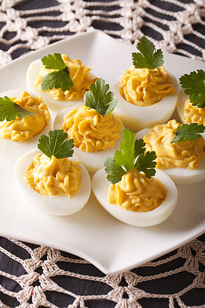 istock Delicious stuffed eggs close-up on a plate on the table 622075258