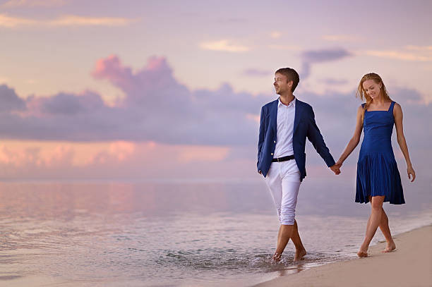 istock Beautiful romantic couple on a tropical beach 622076110