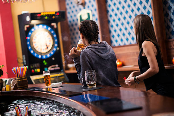 istock Friends playing darts in a club 622077098