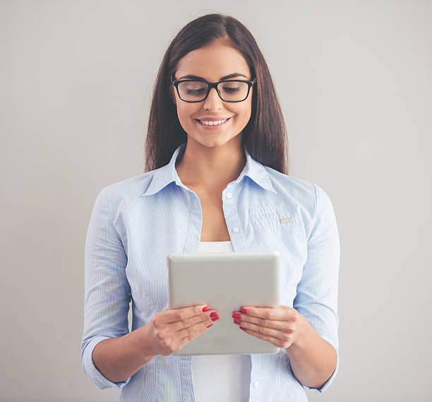 istock Beautiful business lady with gadget 622179792