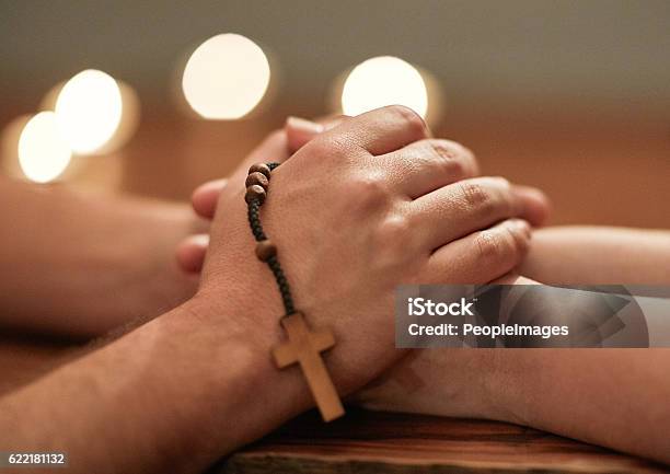 Hands Are There To Help Others Stock Photo - Download Image Now - Church, Candle, A Helping Hand