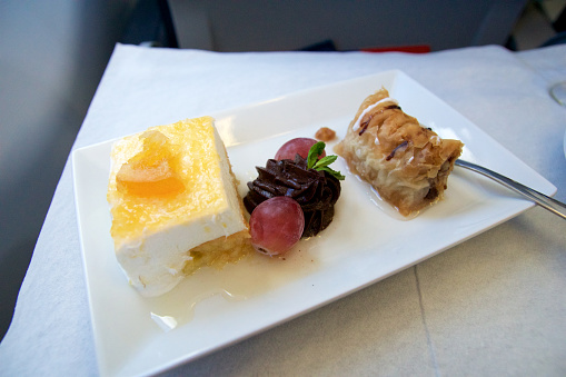 GREECE - OCTOBER 15th, 2016: greek Business Class meal in a plane with dessert.