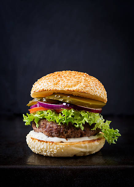 istock Big sandwich - hamburger burger with beef, pickles, tomato 622186370