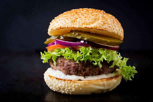 istock Big sandwich - hamburger burger with beef, pickles, tomato 622186448