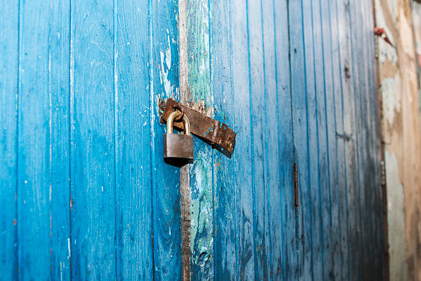 istock old wooden door with metal lock 622187874