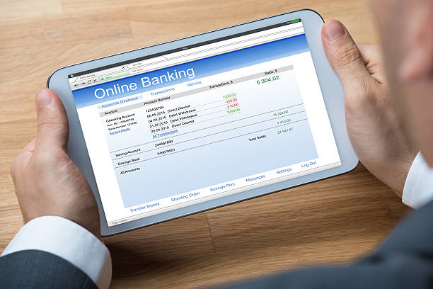 istock Businessman Doing Online Banking On Digital Tablet 622190600