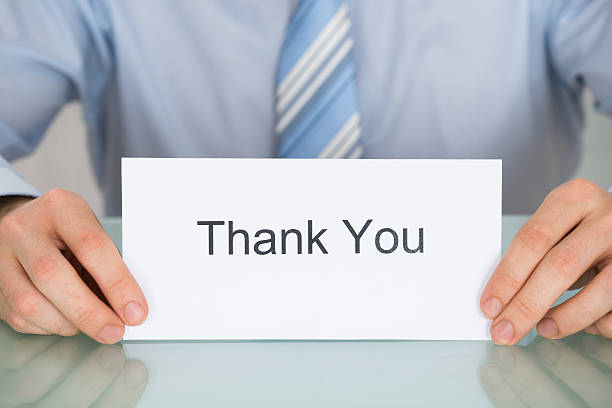 istock Businessman Holding Card With Thank You Text 622191806
