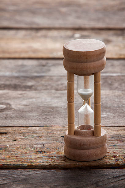 istock Hour Glass on Wood 622192356
