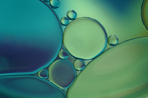 oil drops in water with colorful background