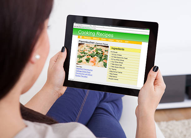 istock Woman Viewing Cooking Recipes 622192990