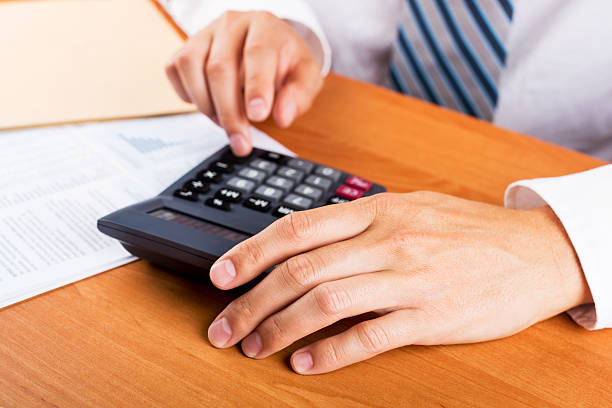 istock Man doing his accounting, financial adviser working 622194530