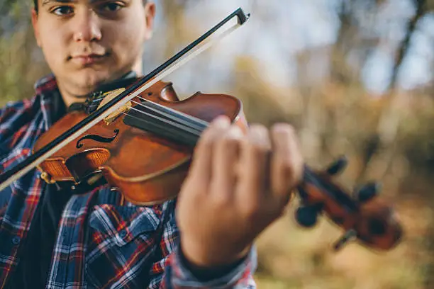 Photo of Violinist in nature