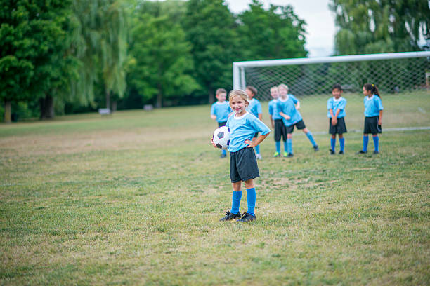 istock Young Girl Playing Soccer 622196020