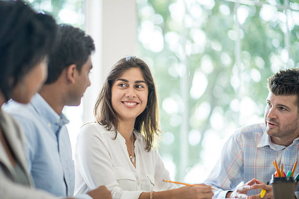 istock Interns Sitting in on a Business Meeting 622196878