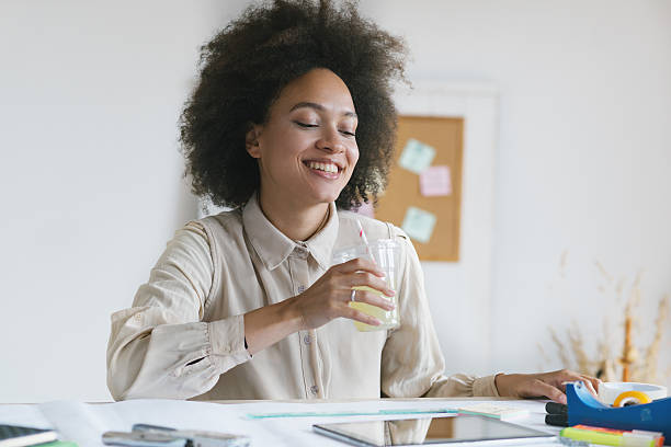 istock Young smiling businesswom working 622202888