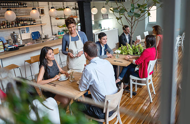 istock Waitress serving couple at a restaurant 622206774