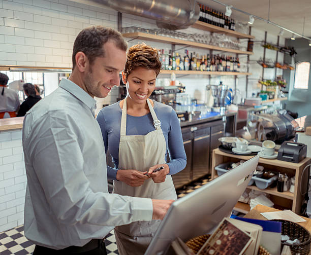 istock Waitress talking to manager at a restaurant 622207208