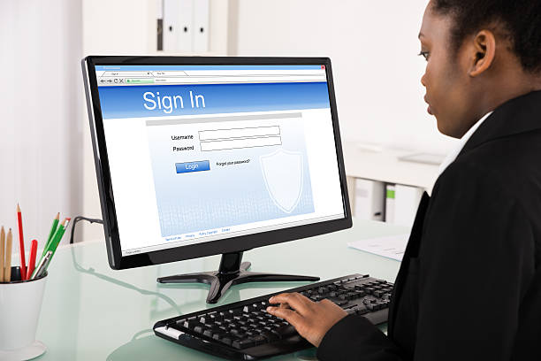 istock Businesswoman Signing Into Website On Computer 622209042