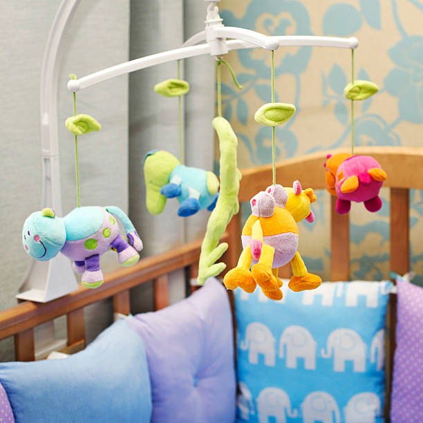 istock toys over a child's bed 622210784