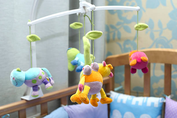 istock toys over a child's bed 622210800