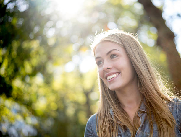 istock Happy woman at the park 622211688