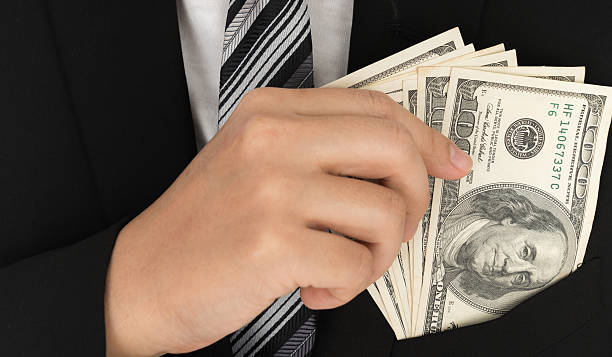 istock One hundred dollar bills in pocket 622212092