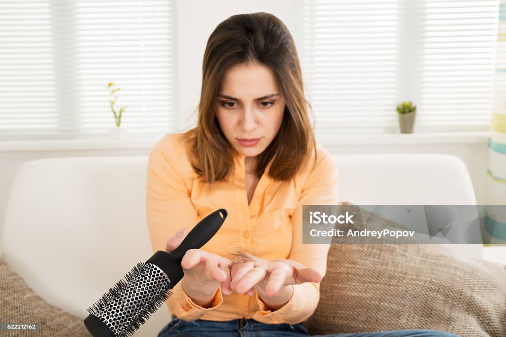 Woman Suffering From Hairloss Woman Holding Comb Looking At Loss Hair Falling Stock Photo