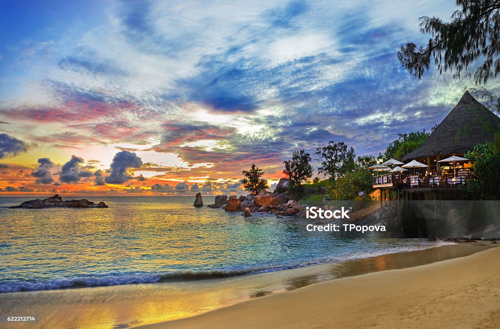 Cafe on tropical beach at sunset Cafe on tropical beach at sunset - nature background Restaurant Stock Photo