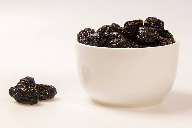 istock Dried plums in bowl. 622213440