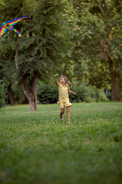istock Girl with a kite 622213464