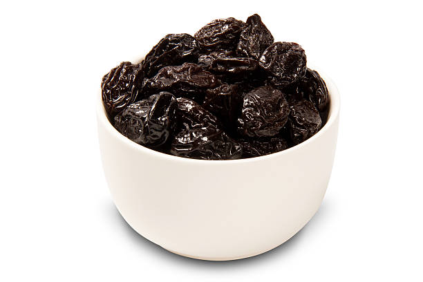 istock Dried plums in bowl. 622213636