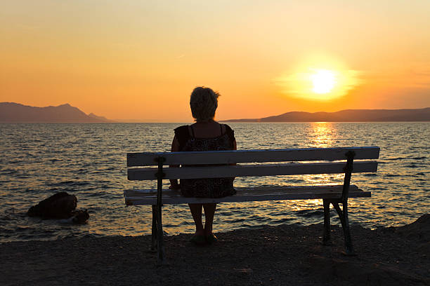 istock Woman and sunset 622216898