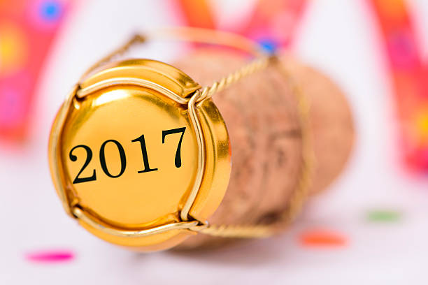 istock new year 2017 with cork of champagne 622217718