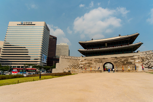 Seoul, Korea - September 24, 2016: Tourists at Sungnyemun Gate - old and modern architecture in Seoul
