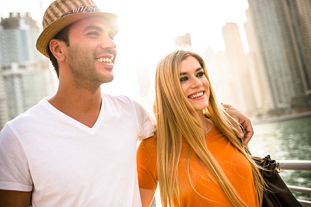 istock togetherness couple in vacations on Dubai Marina - UAE 622222092