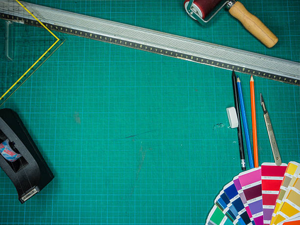 istock Cutting mat with various stationary tools, shot from above 622222774