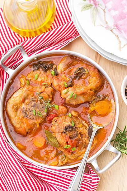 Turkey ossobuco osso buco in tomato gravy with mushrooms Turkey ossobuco osso buco in tomato gravy with mushrooms and vegetables ossobuco stock pictures, royalty-free photos & images