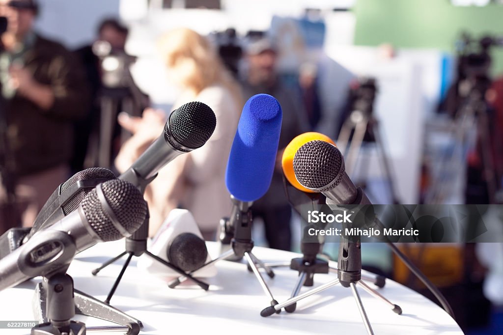 News conference Microphones at press conference Press Conference Stock Photo