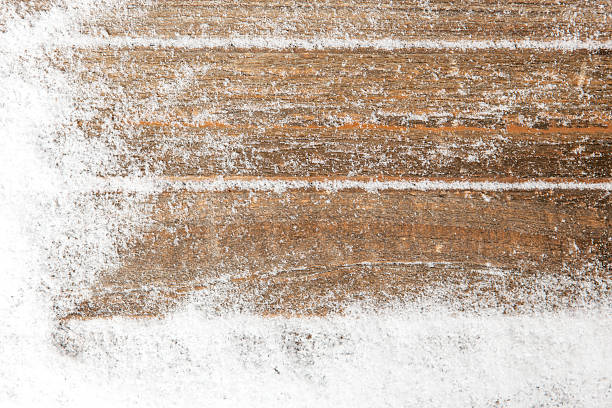 istock snow background on wood 622278418