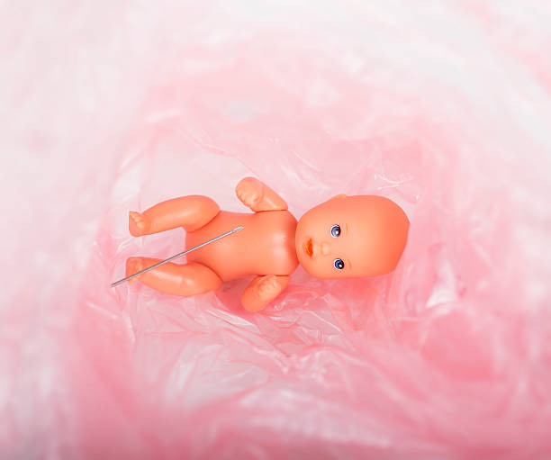 baby doll on hand isolated on white backgroundbaby doll on hand isolated on white background