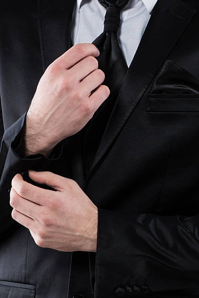 istock Businessman Fixing Cufflinks his Suit 622278608