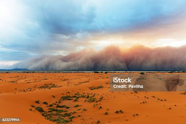 Sandstorm Approaching Merzouga Settlementin Erg Chebbi Desert Moroccoafrica Stock Photo - Download Image Now