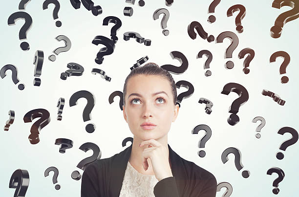 istock woman in black and white clothes and floating question 622280474