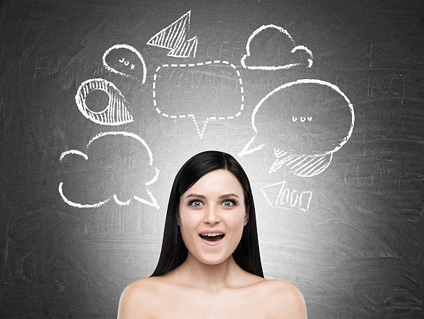 istock Amazed woman and dialogue boxes on blackboard 622282164