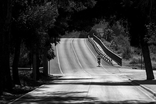 Cyclist on a road.